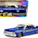 1964 Chevrolet Impala Lowrider Hard Top Candy Blue Metallic with Cream Top "Get Low" Series 1/24 Diecast Model Car by Motormax 1964 Chevrolet Impala Lowrider Hard Top Candy Blue Metallic with Cream Top "Get Low" Series 1/24 Diecast Model Car by Motormax