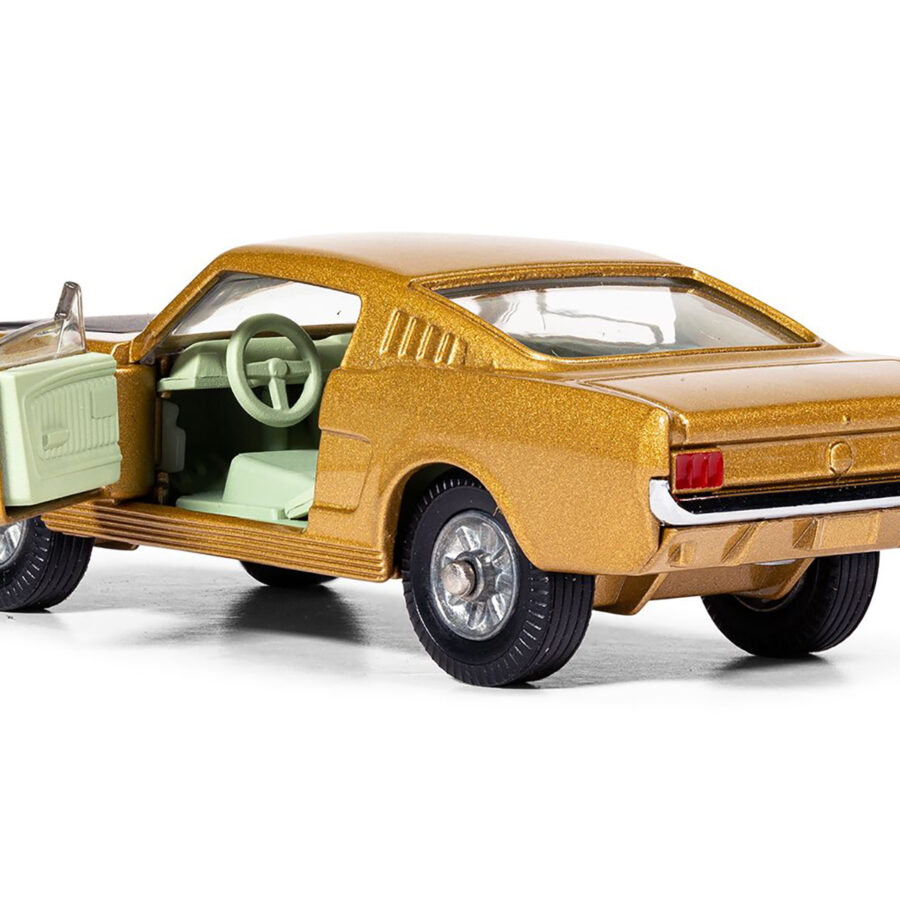 Ford Mustang Fastback 2+2 Gold Metallic and Black Diecast Model Car by Corgi from the Ford store collection.