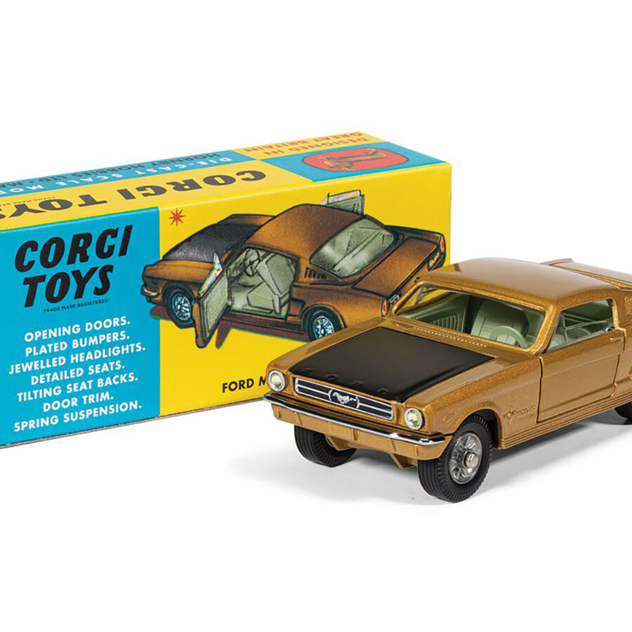 Ford Mustang Fastback 2+2 Gold Metallic and Black Diecast Model Car by Corgi from the Ford store collection.