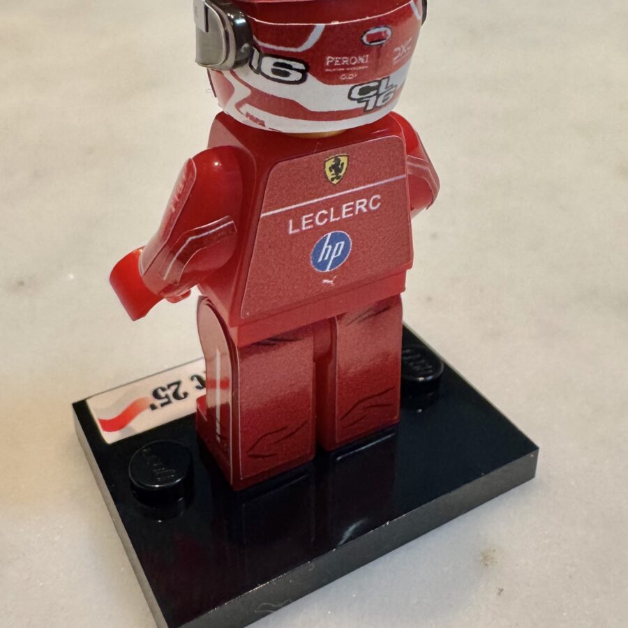 F1 Minifigure Charles Leclerc 2025 HP Ferrari formula 1 grand prix pilota driver minifigure from the WEC & Le Mans Memorabilia store collection.