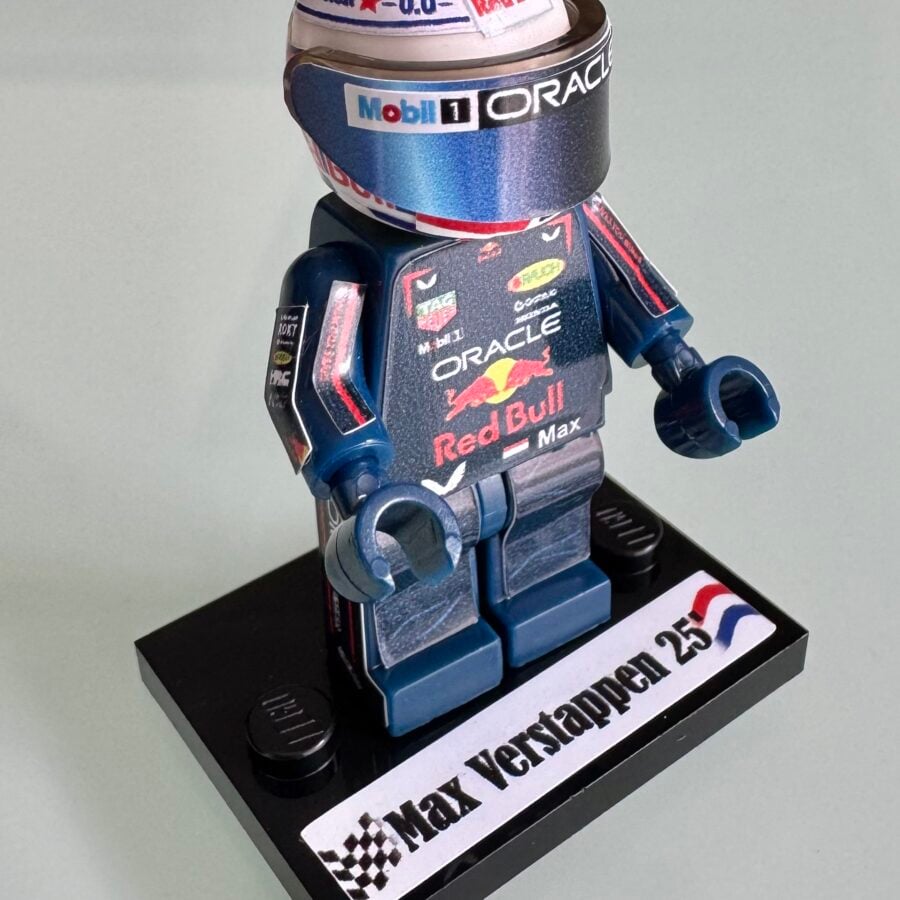 F1 Minifigure Max Verstappen 2025 world Champion formula 1 grand prix pilota driver minifigure from the Manor Racing F1 Team store collection.