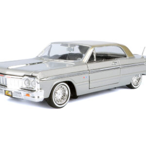 1964 Chevrolet Impala Lowrider Hard Top Silver Metallic with Gold Metallic Top "Get Low" Series 1/24 Diecast Model Car by Motormax from the Sports Car Racing Gifts store collection.