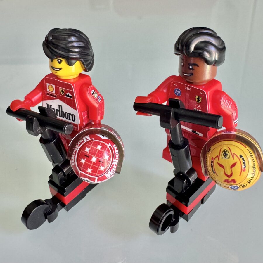 F1 Minifigure Scooter Hamilton 2025 And Schumacher 2000 F1 Ferrari from the Sports Car Racing Race Suits store collection.